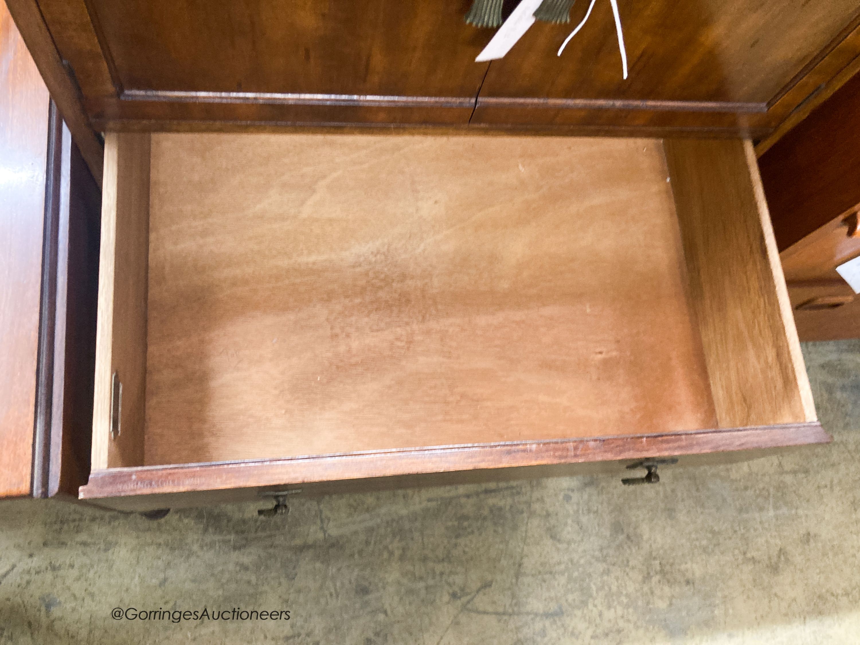 A 1920's mahogany three drawer side cabinet, stamped Waring & Gillow, W.61cm D.44cm H.110cm